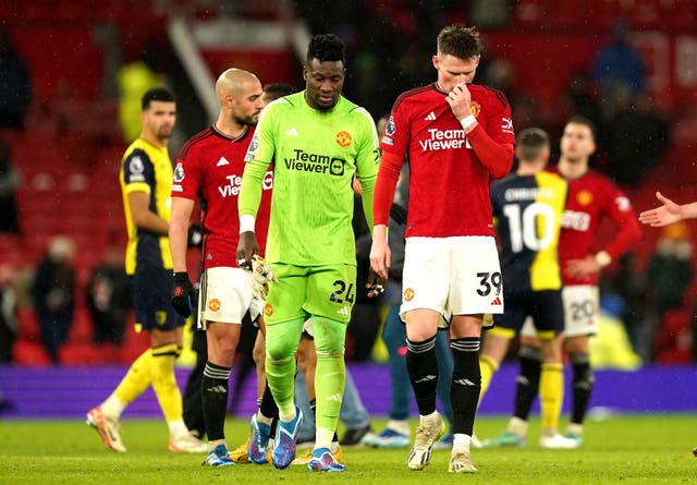 Manchester United goalkeeper Andre Onana (left) and Scott McTominay look dejected