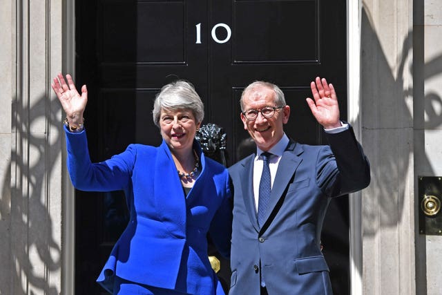 Theresa May with her husband Philip outside 10 Downing Street 