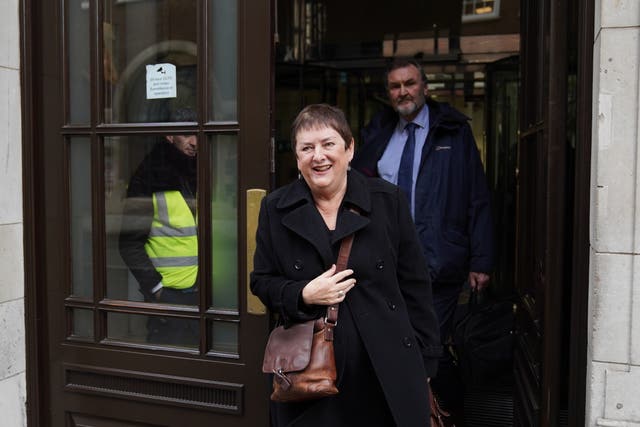 Kevin Courtney and Mary Bousted, joint general secretaries of the National Education Union, leaving the Department for Education in London (PA)