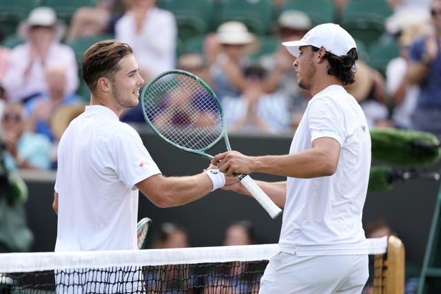 Luciano Darderi (right) celebrates winning his match against Arthur Fery 