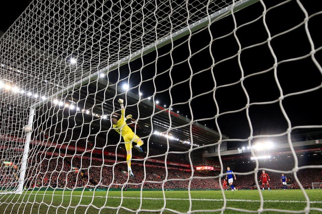 Everton goalkeeper Jordan Pickford is beaten by Curtis Jones' shot in Liverpool's 1-0 FA Cup win