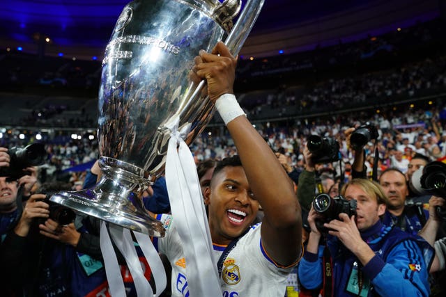 Real Madrid’s de Goes Rodrygo with the UEFA Champions League trophy following the UEFA Champions League Final at the Stade de France, Paris. Picture date: Saturday May 28, 2022.