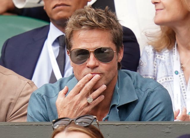 Brad Pitt watching the match 