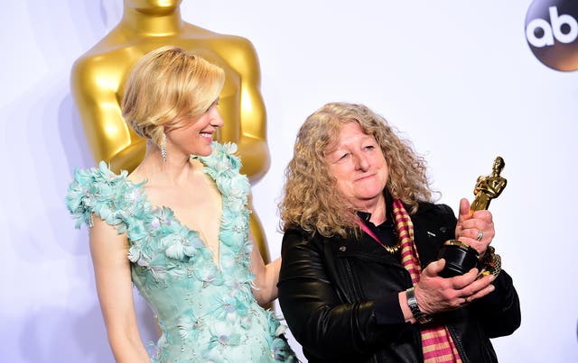 Cate Blanchett presenting Jenny Beavan with the Academy Award for Best Costume Design