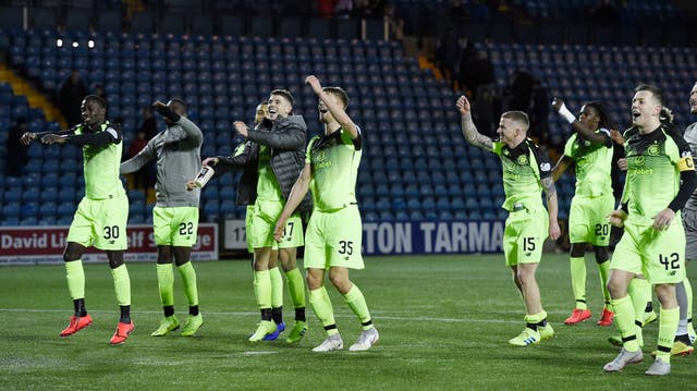 Celtic players celebrate their dramatic win 