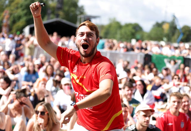 Back in London, a Spain fan celebrates in Victoria Park