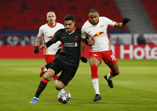 Ozan Kabak, left, helped Liverpool keep a clean sheet in Budapest (Trenka Attila/PA)