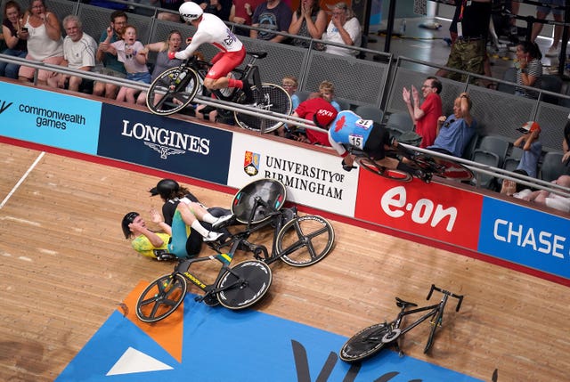 England’s Matt Walls goes over the barrier and into the crowd during a terrifying accident at the Commonwealth Games. The Olympic omnium champion received treatment for more than 40 minutes at the Lee Valley VeloPark before being taken away by ambulance. Two other riders – the Isle of Man’s Matt Bostock and Canada’s Derek Gee – were also taken to hospital, while two spectators were treated for minor injuries. The incident prompted Dame Laura Kenny to call for the installation of bigger barriers or screens at velodromes