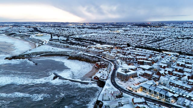 Morning snow in Cullercoats Bay in North Tyneside