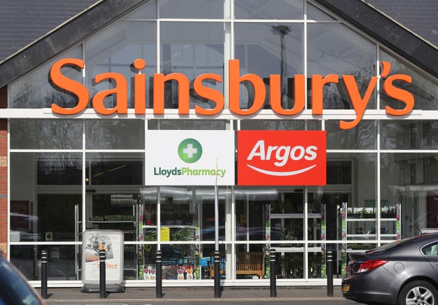 Sainsbury’s store exterior with Argos and Lloyd's Pharmacy signs