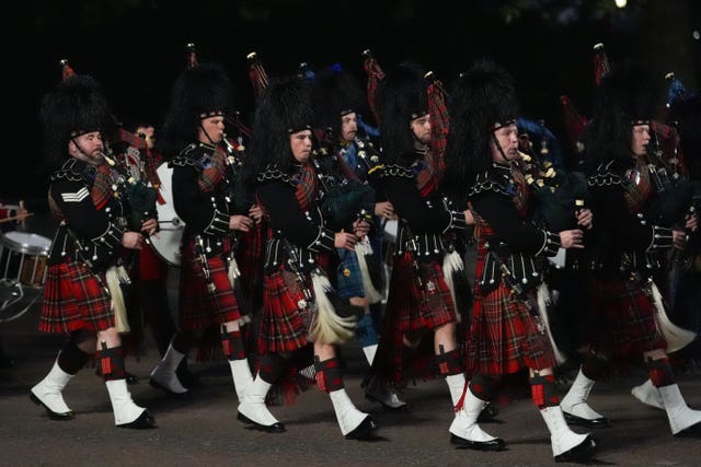 Members of the armed forces march during a procession rehearsal in preparation for the VE Day 80th anniversary