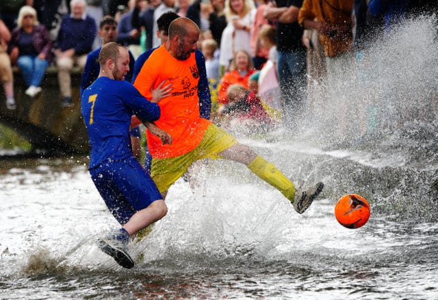 Annual river football match continues to excite crowds in Cotswold ...