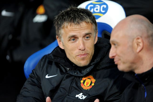 Phil Neville's coaching experience has been in men's football