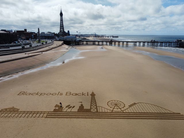 Sand art on the beach as Blackpool's indoor attractions, hotels and guesthouses, show venues, and indoor hospitality reopen (Peter Byrne/PA)