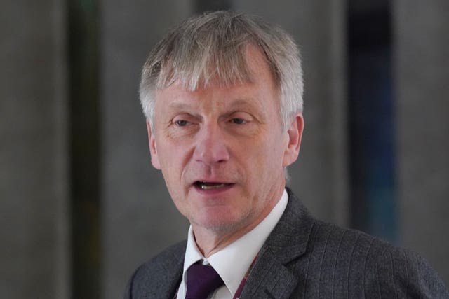 Headshot of Ivan McKee speaking