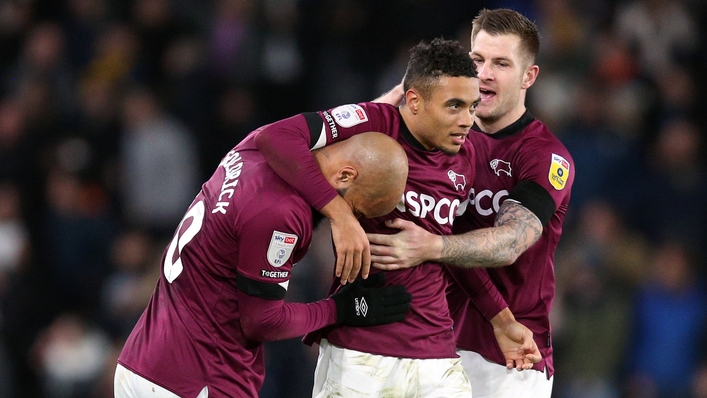 Lewis Dobbin, centre, celebrates his winning goal (Nigel French/PA)