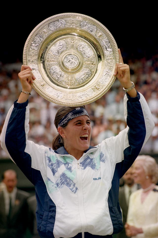 Conchita Martinez lifts the Wimbledon title in 1994