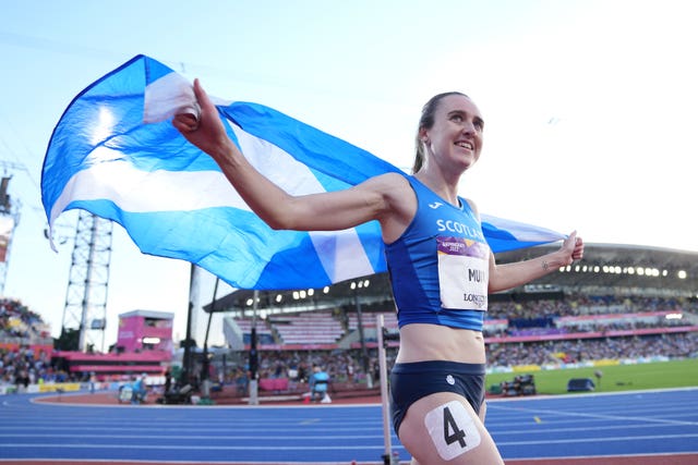 Laura Muir with a Scottish flag after racing at the Commonwealth Games in 2022
