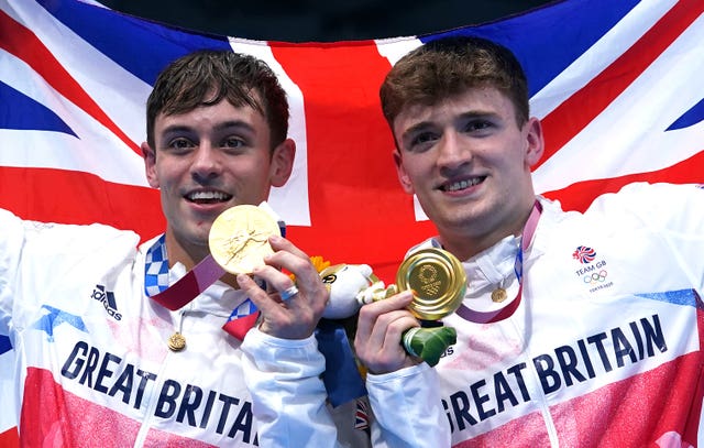 Olympic champion at last - Daley, left, and Lee strike gold at Tokyo