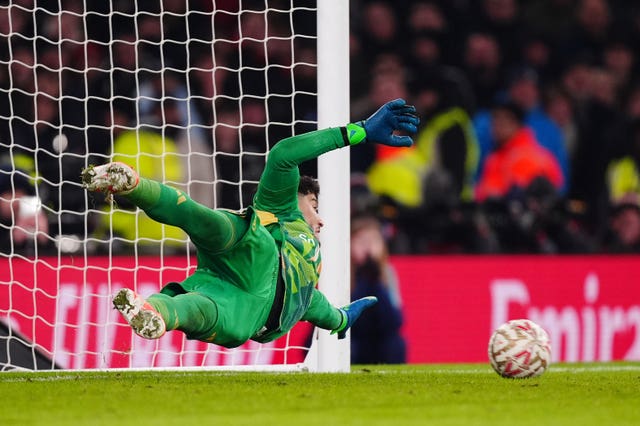 Altay Bayindir saves a penalty from Kai Havertz