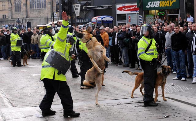 Fans clas with police at derby match