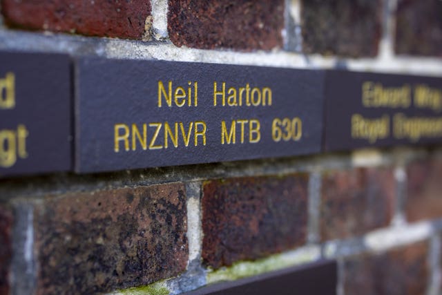 Royal New Zealand Naval Volunteer Reserve Lieutenant Neil W Harton is honoured on the wall 