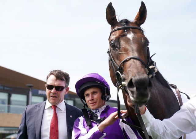 Trainer Aidan O’Brien (left) and jockey Ryan Moore with Order Of Australia