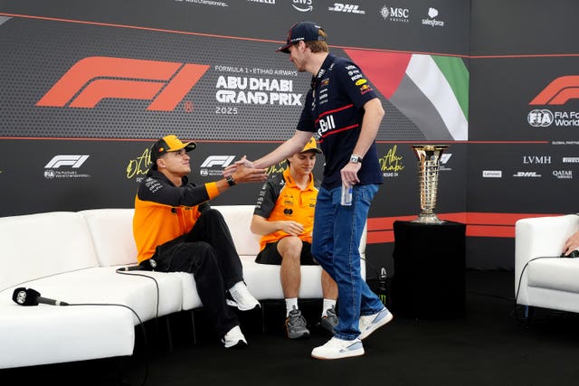 Lando Norris (left) greets Max Verstappen 
