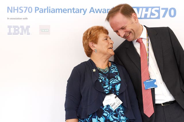 Simon Stevens at the NHS70 Parliamentary awards with the winner of the lifetime achievement award Rose Bennett (PA)