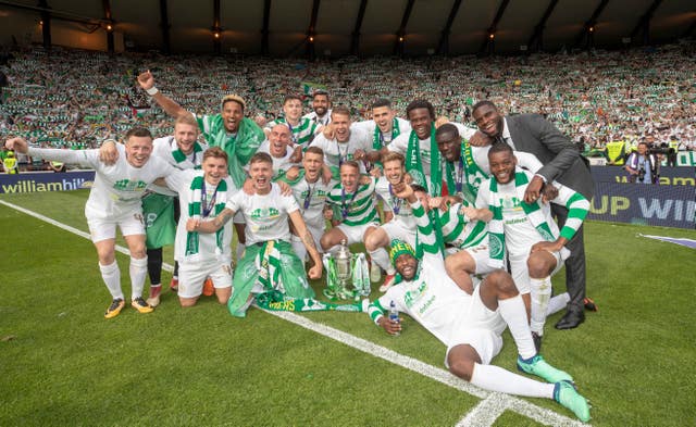 The victorious Celtic squad lap up their double treble triumph