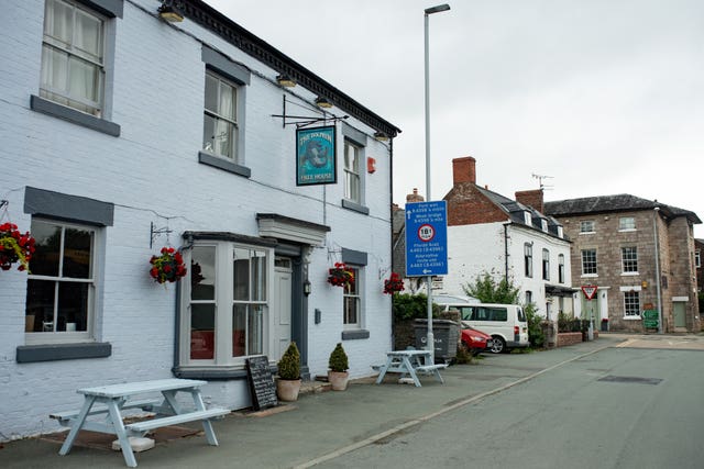 The Dolphin, in Wales, (L) and the Cross Keys, in England, (R) (Jacob King/PA)