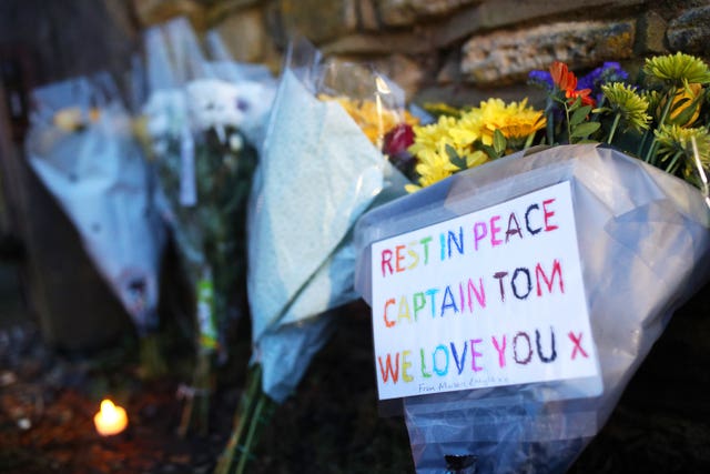 Floral tributes left outside the home of Sir Tom 