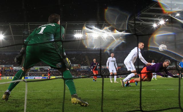 Manchester City’s Sergio Aguero scores