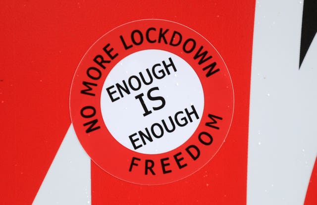 An anti-lockdown sticker in Nottingham city centre. More than three quarters of England’s population is being ordered to stay at home to stop the spread of coronavirus