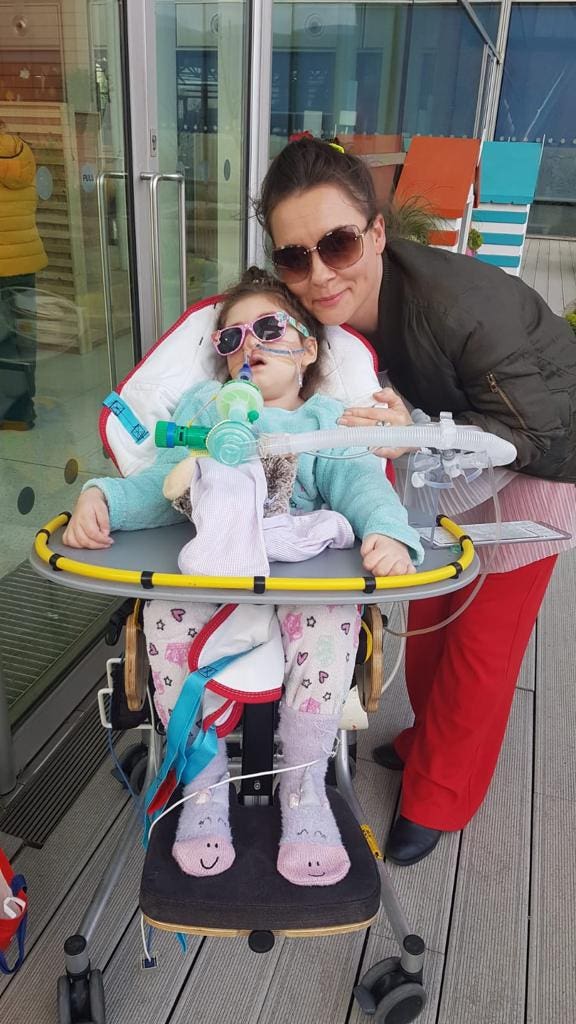 Paula Parfitt and daughter outside due to portable ventilator