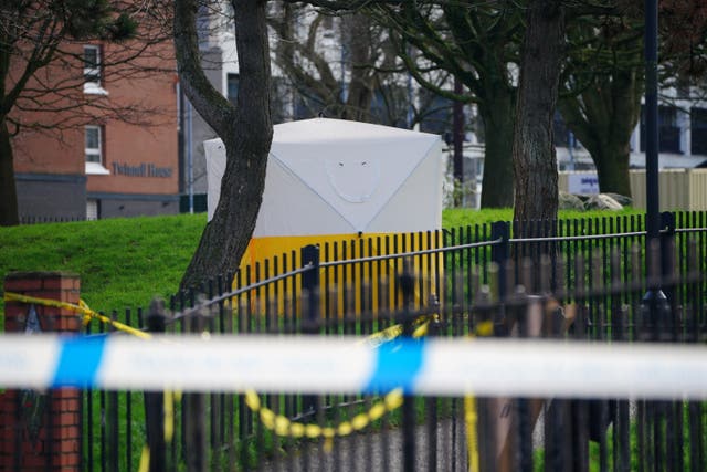 A police tent in a park 