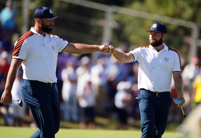 Jon Rahm (left) and Tyrrell Hatton bump fists during the 2023 Ryder Cupfile photo