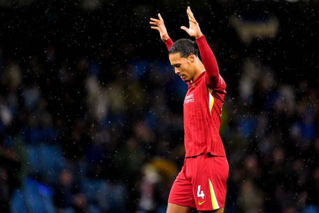 Liverpool’s Virgil van Dijk celebrates their victory at Manchester City