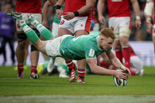 Ciaran Frawley scores Ireland’s third try in a 31-7 Six Nations victory over Wales