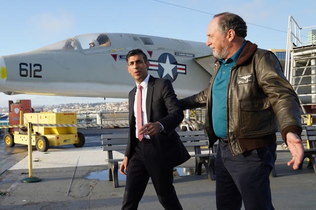 Rishi Sunak on the deck of the aircraft carrier USS Midway in San Diego