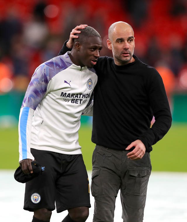 Pep Guardiola, right, defended the decision to select Benjamin Mendy last weekend 