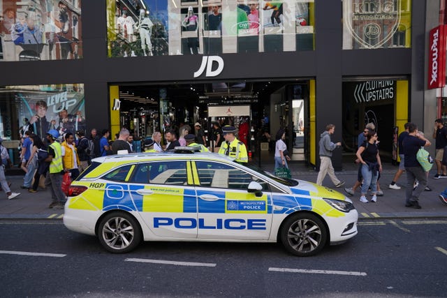 Police car outside of JD on Oxford Street
