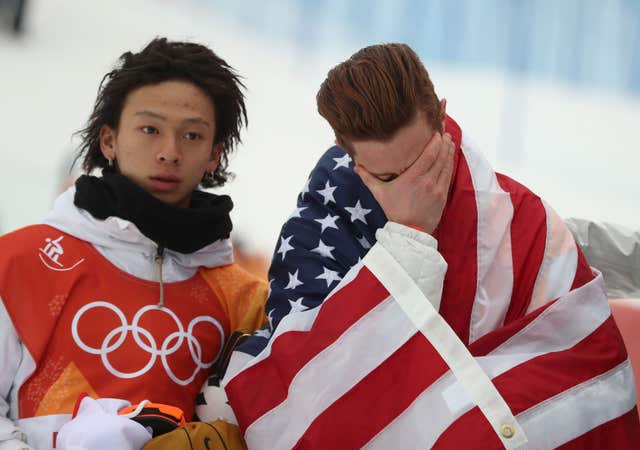 USA’s Shaun White gets emotional after claiming an historic third Olympic halfpipe gold