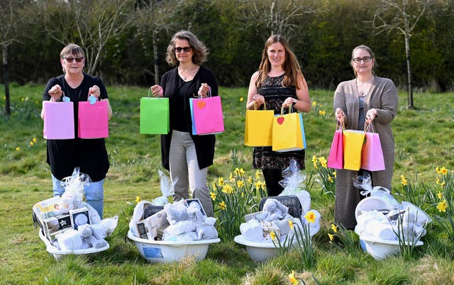 Lottery winners helping out at a charity