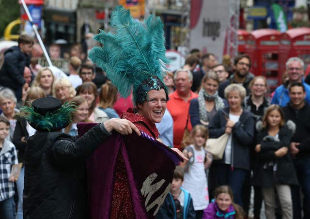 Street performer Able Mable during her act on the Royal Mile in 2017 (Andrew Milligan/PA)