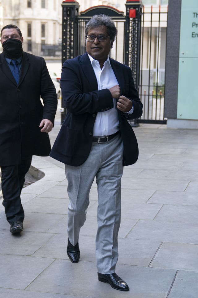 Lalit Modi, a businessman who founded the Indian Premier League cricket, arrives at the Rolls Building at the High Court in London