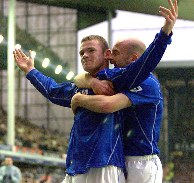 Everton’s Wayne Rooney (left) celebrates scoring against Blackburn with team mate Lee Carsley