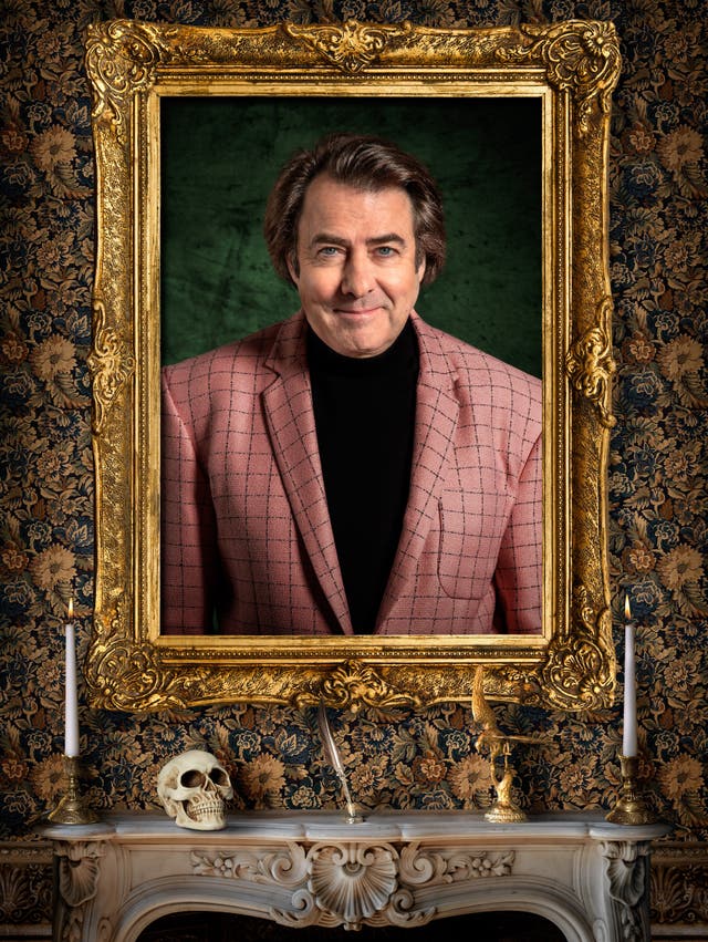 Jonathan Ross smiles in a publicity shot for The Celebrity Traitors