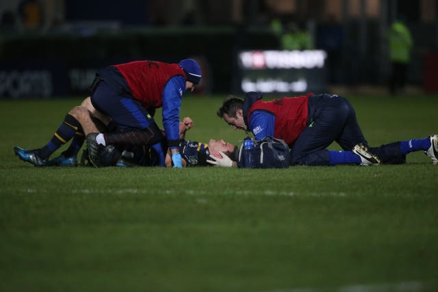 Rugby's Johnny Sexton lies injured (Niall Carson/PA)