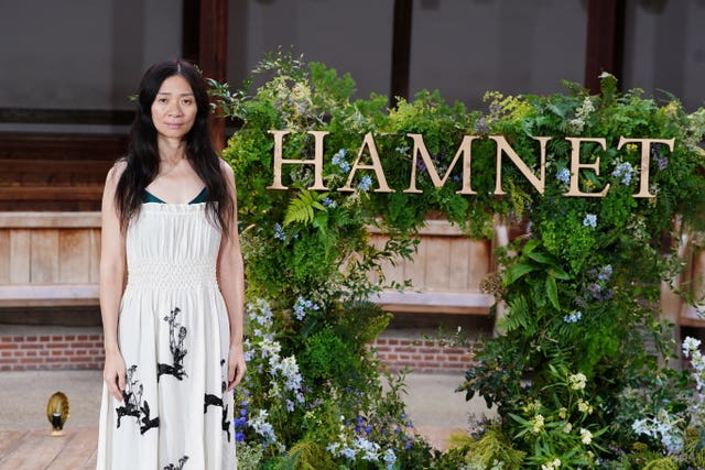 Chloe Zhao attending a photocall for Hamnet at Shakespeare’s Globe in London